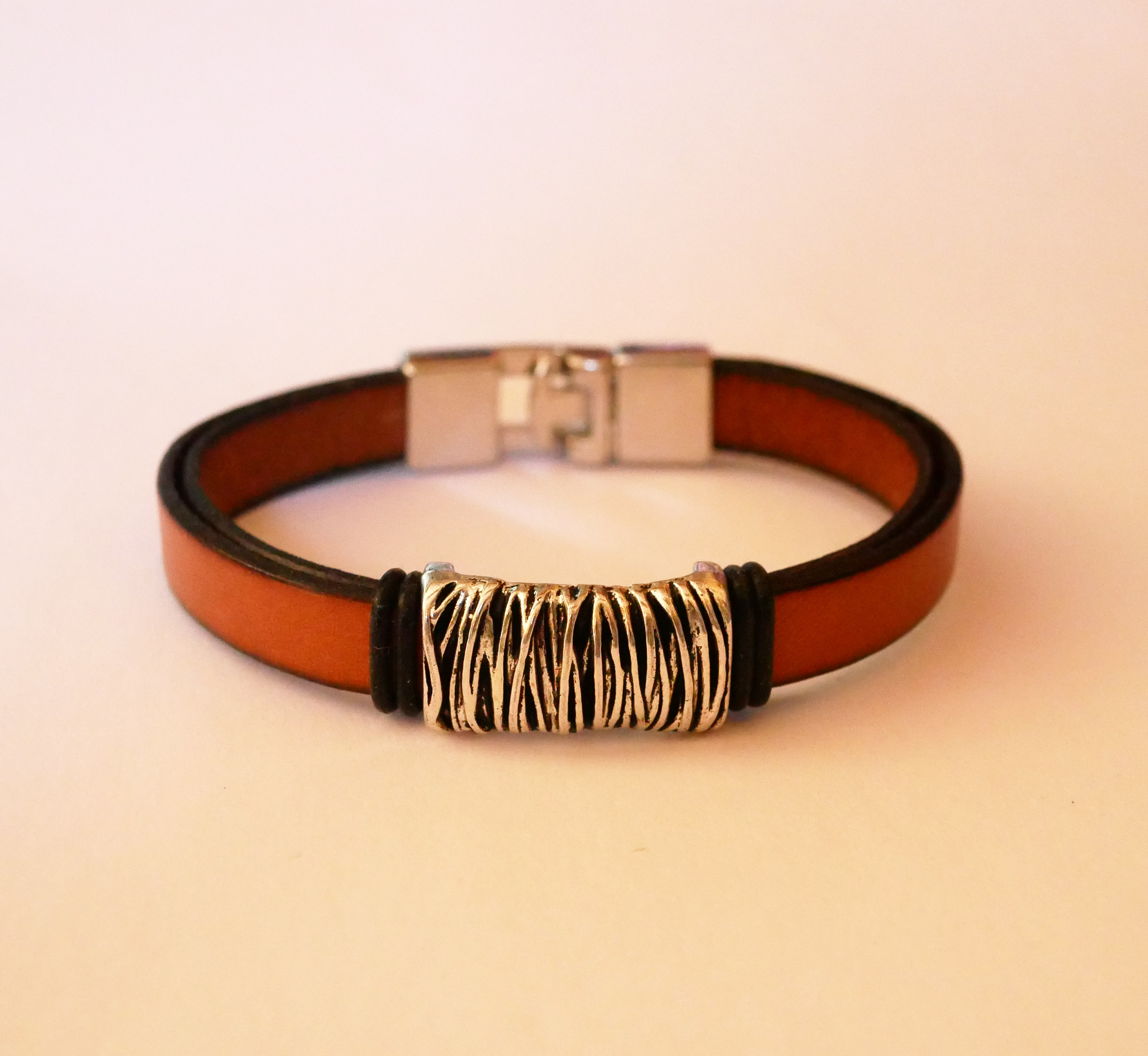 Camel leather strap with braided metal decoration and T-shaped clasp