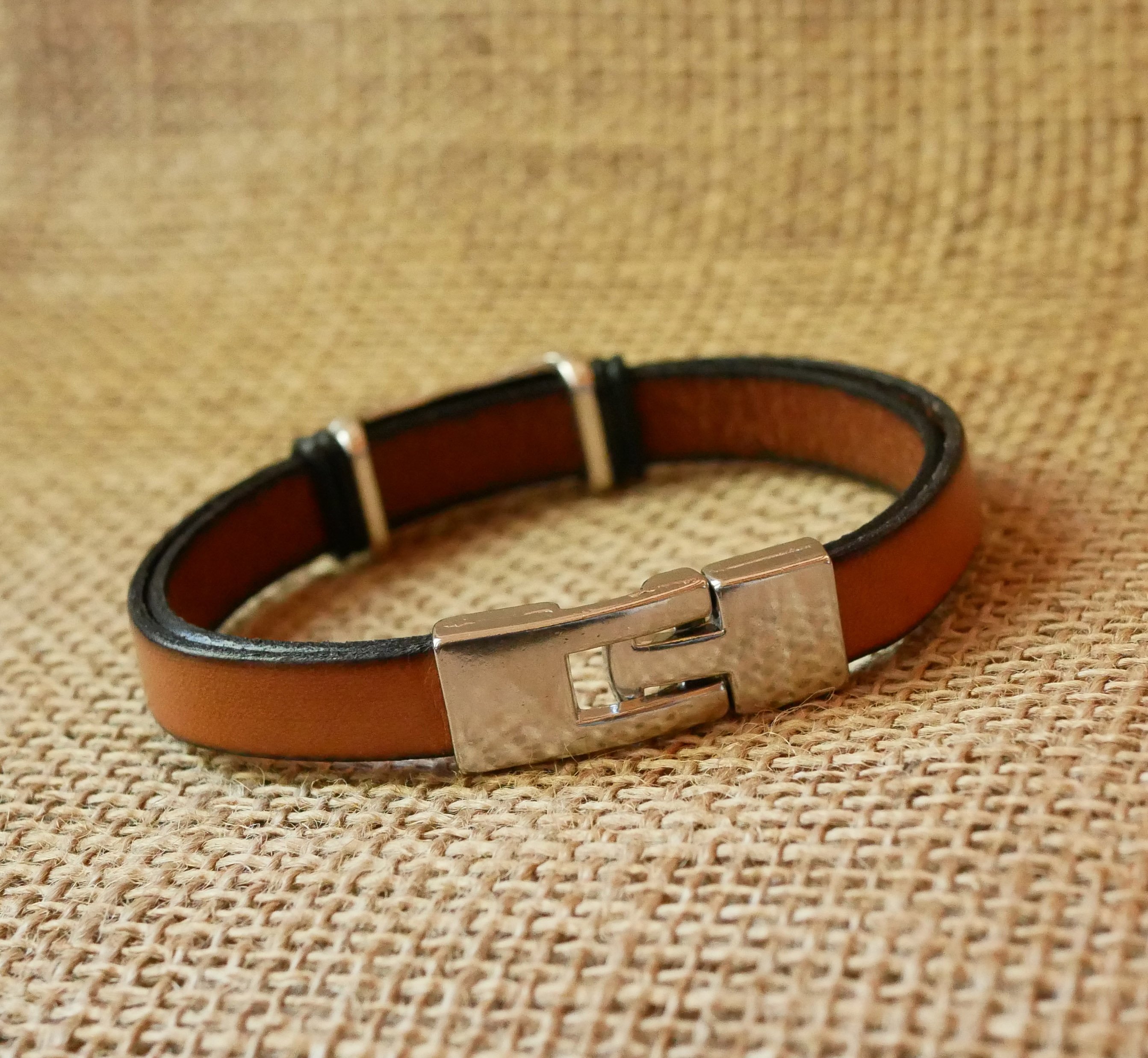 Camel leather strap with braided metal decoration and T-shaped clasp