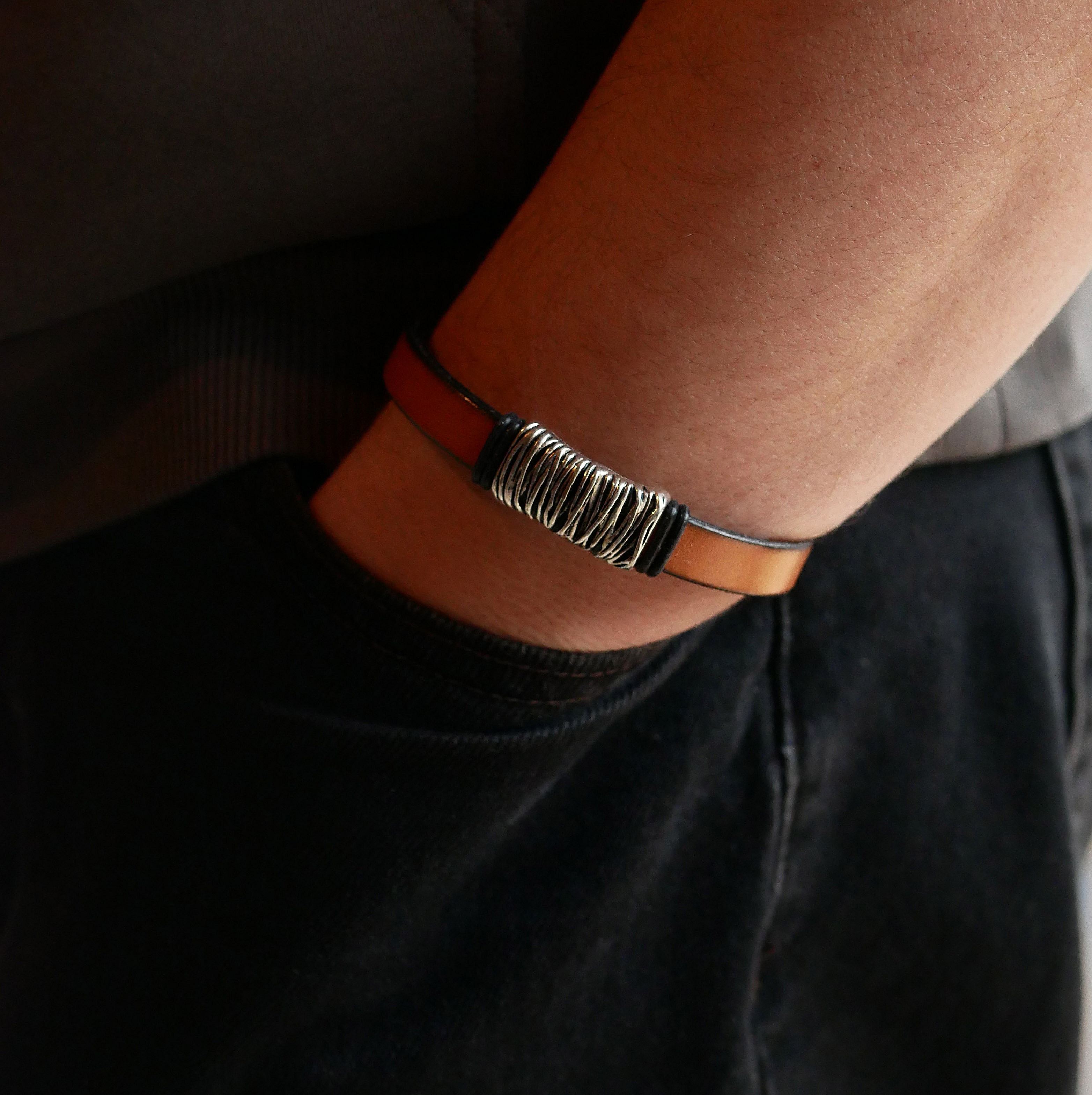 Camel leather strap with braided metal decoration and T-shaped clasp