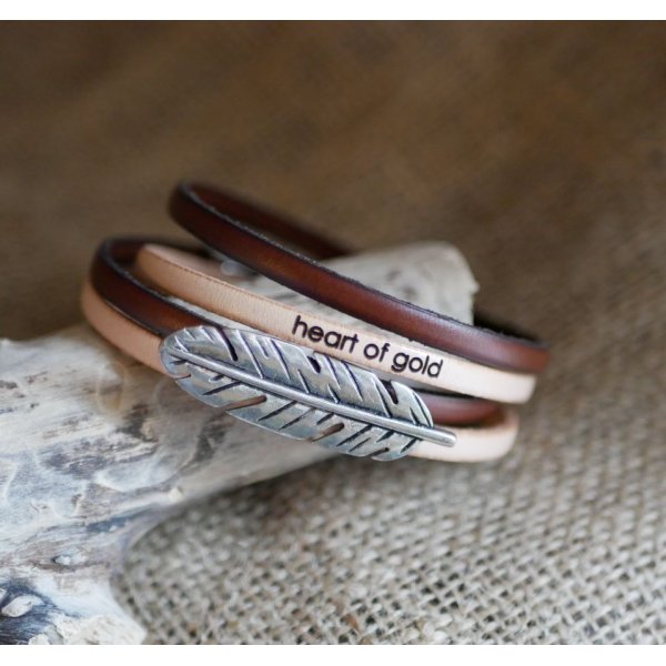 Double leather strap in duo decorated with a silver feather