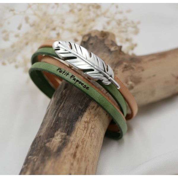 Double leather strap in duo decorated with a silver feather