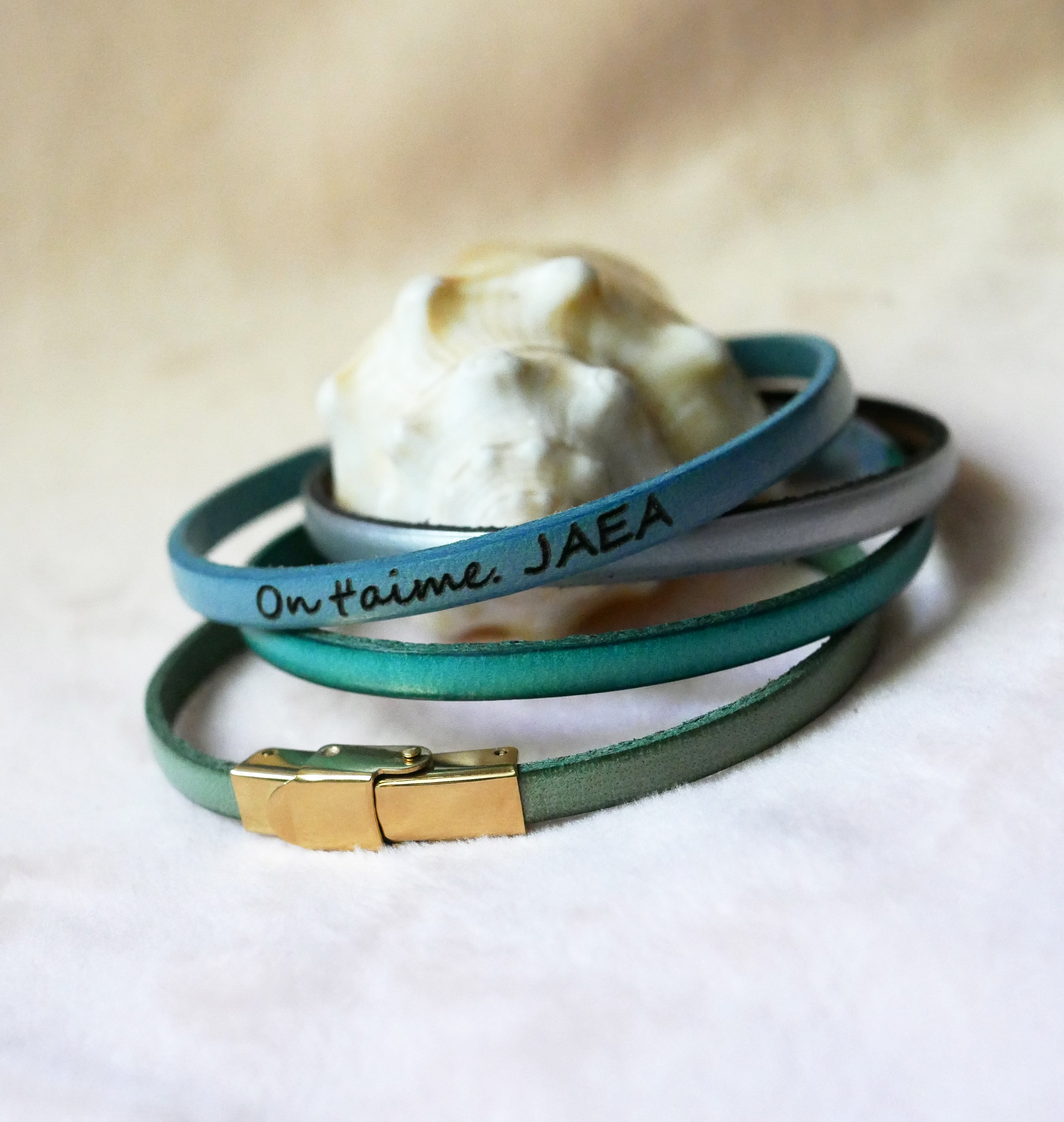 Fine leather strap with adjustable gold clasp, customizable by engraving 