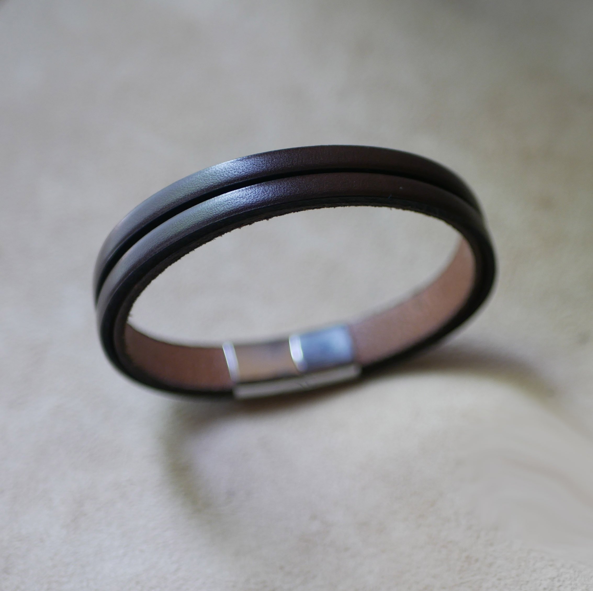 Two-tone men's leather bracelet with hidden engraved message