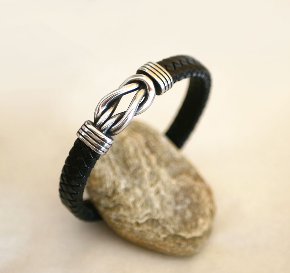 Black leather bracelet with Celtic knot magnetic steel clasp