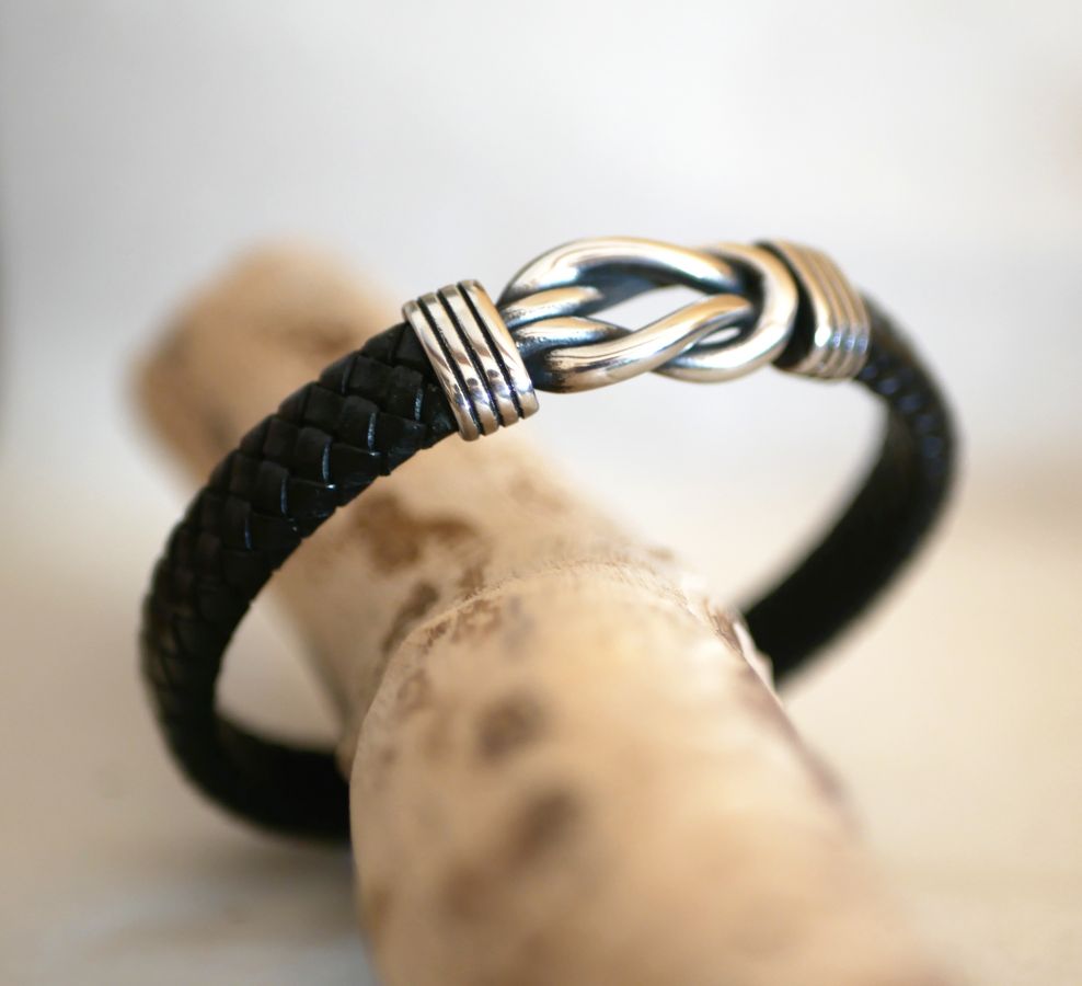 Black leather bracelet with Celtic knot magnetic steel clasp