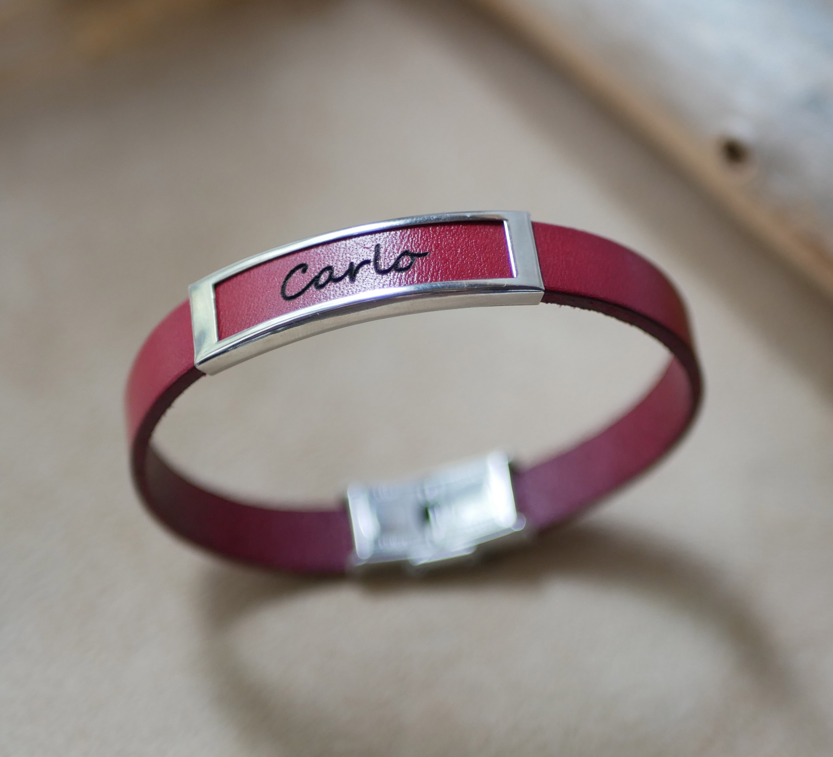 Leather strap with stainless steel frame engraved with a first name or a word 