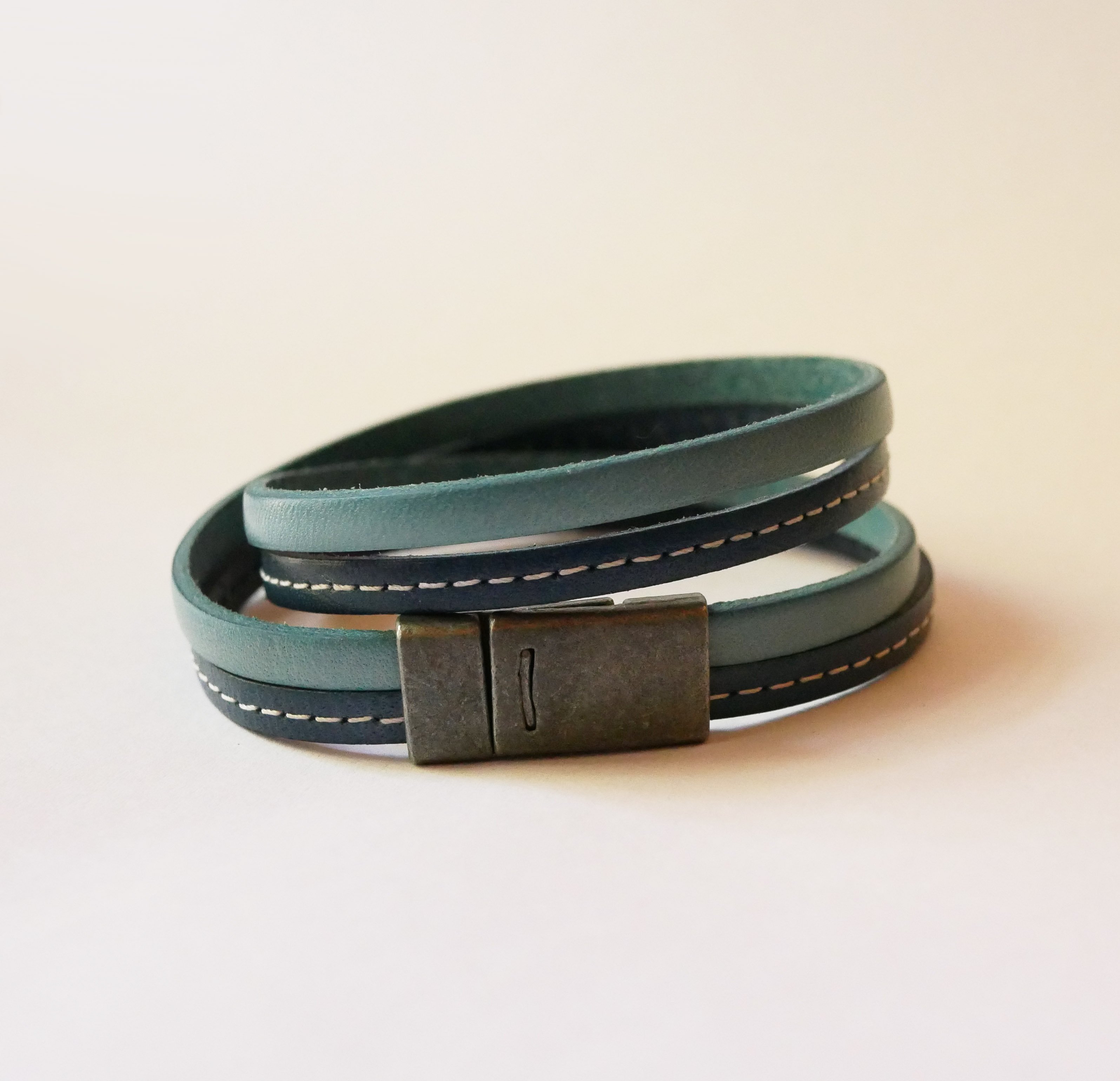 Blue double-stitched leather strap with magnetic clasp