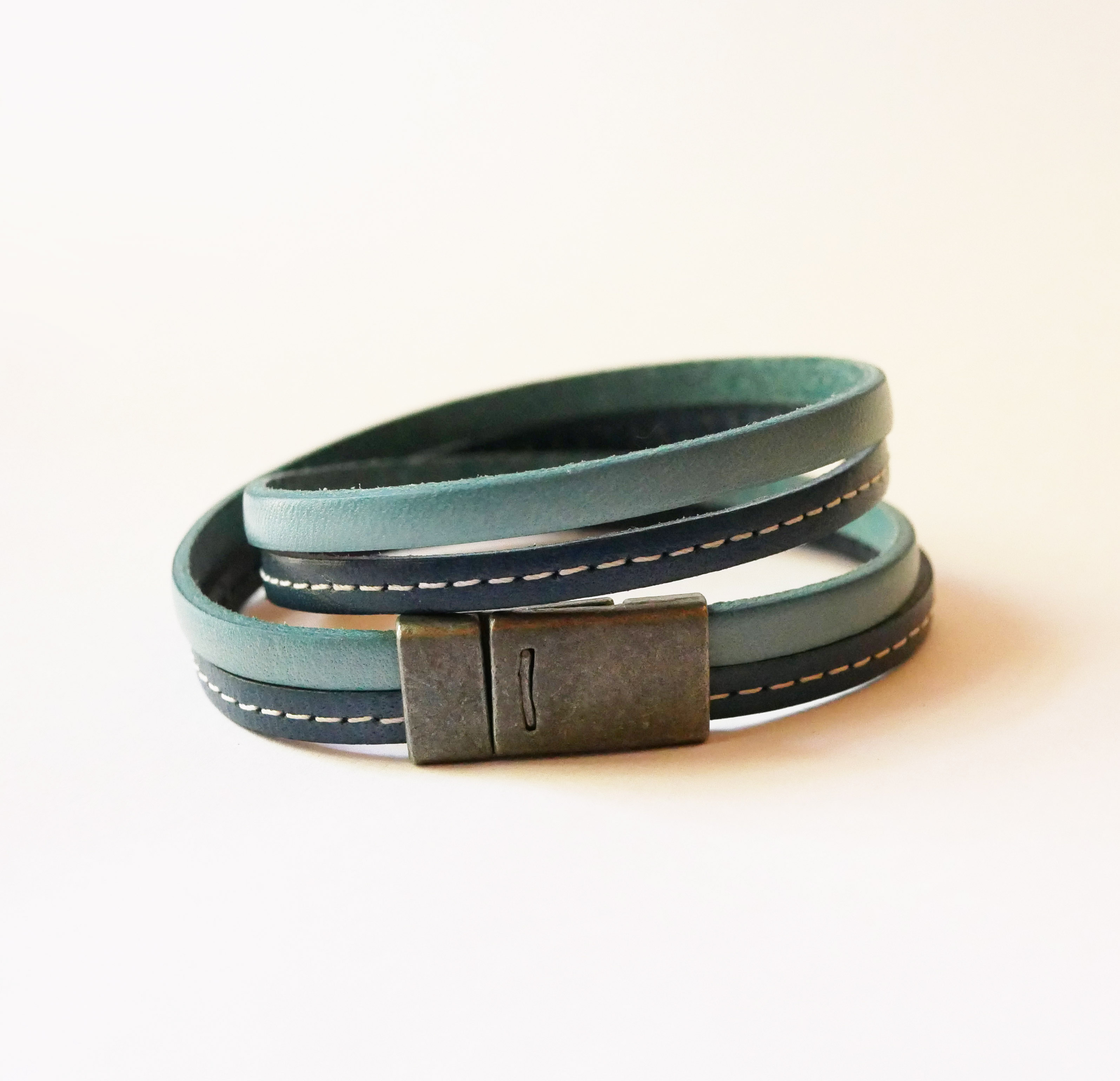 Blue double-stitched leather strap with magnetic clasp