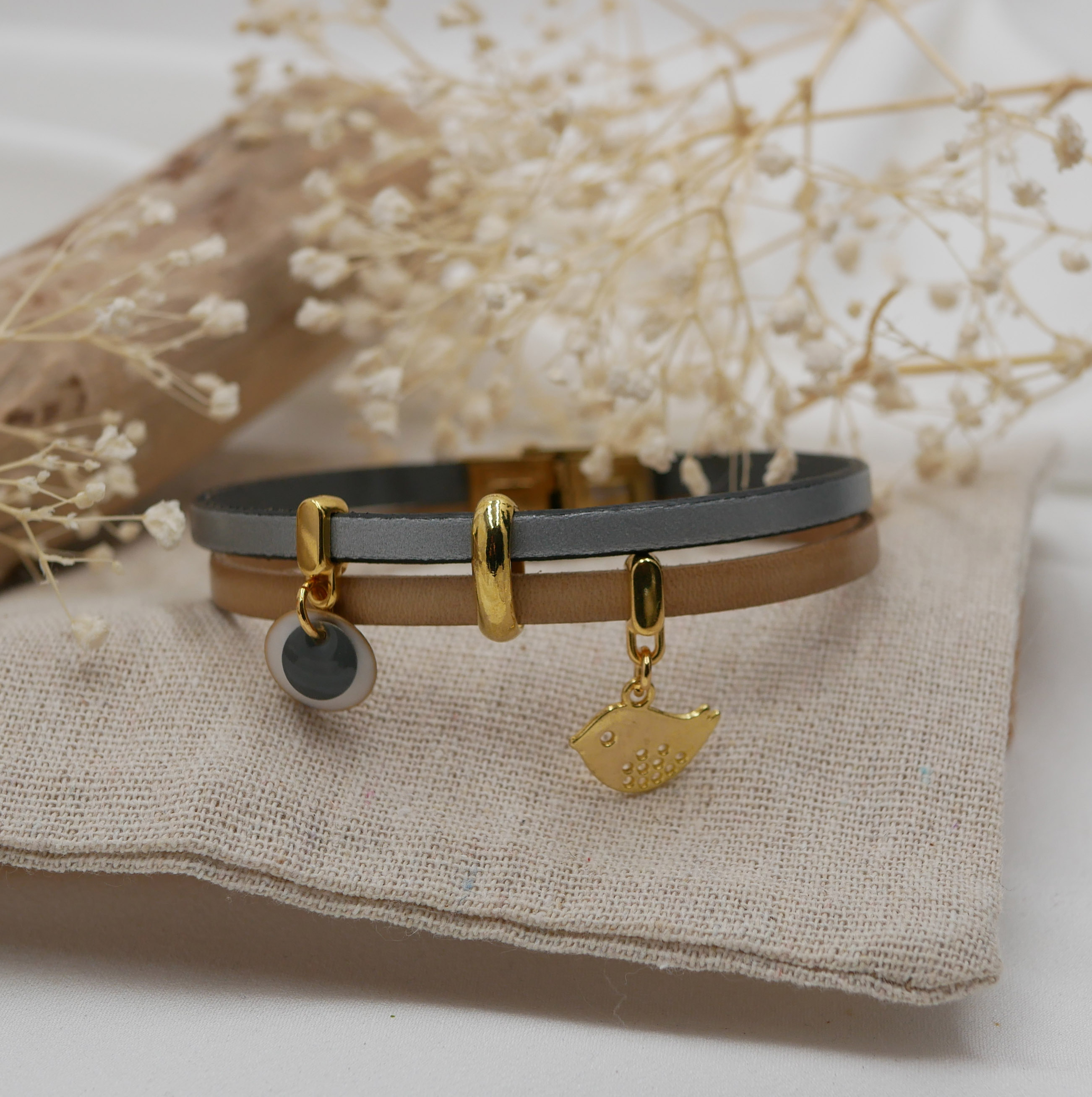 Leather duo bracelet with golden sequins and bird charms