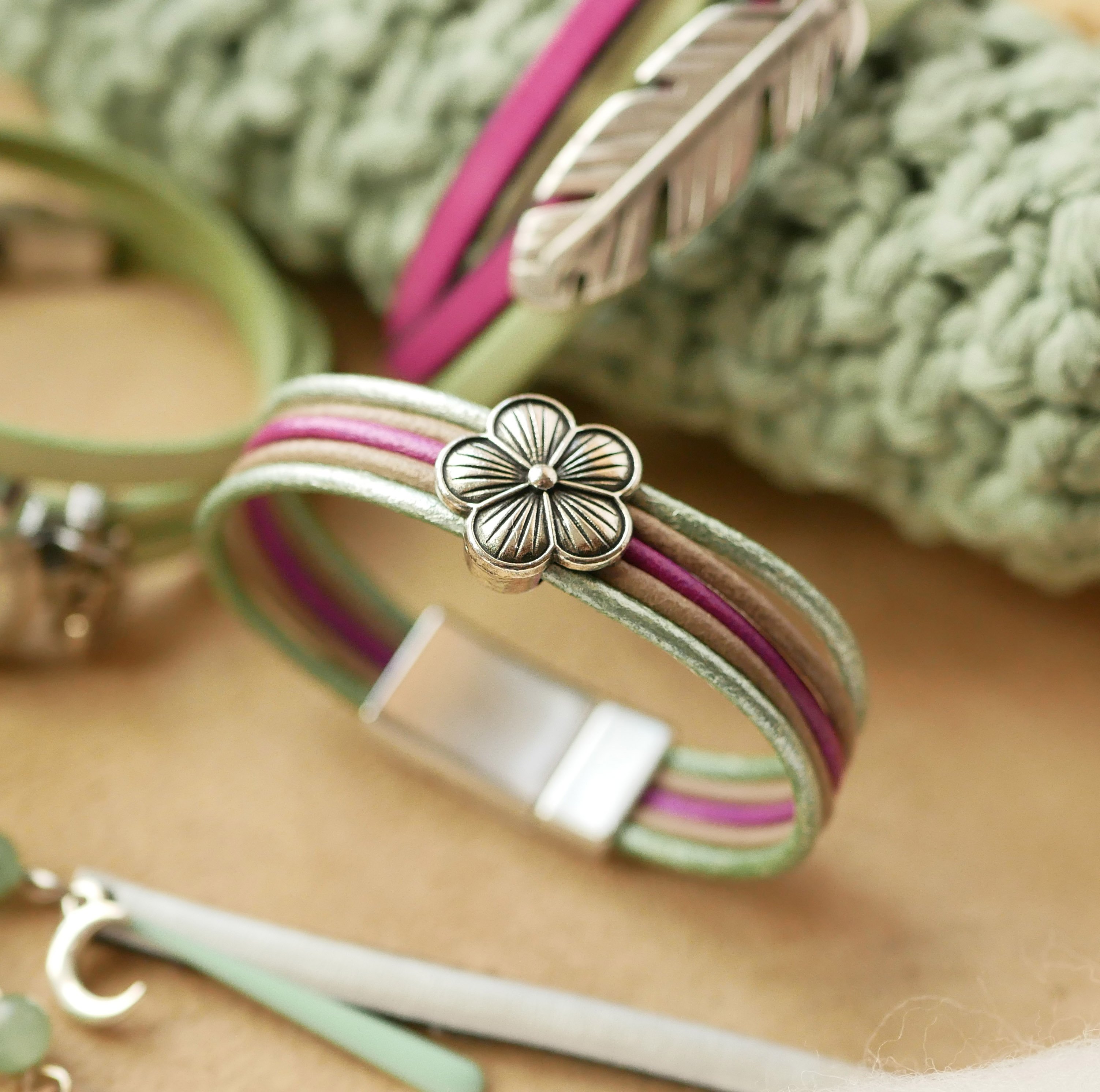 Women's bracelet with pastel leathers and silver flower design