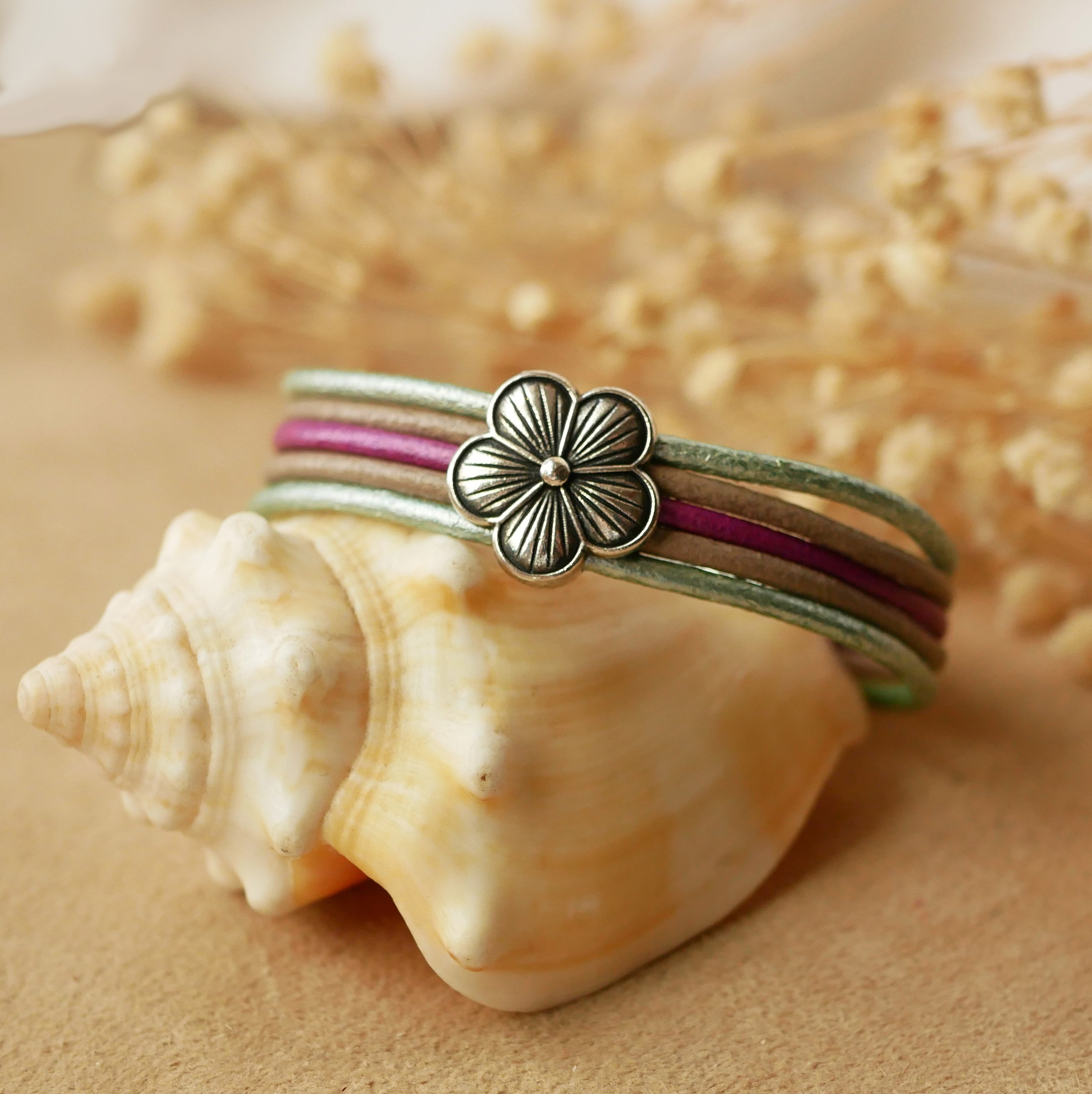 Women's bracelet with pastel leathers and silver flower design