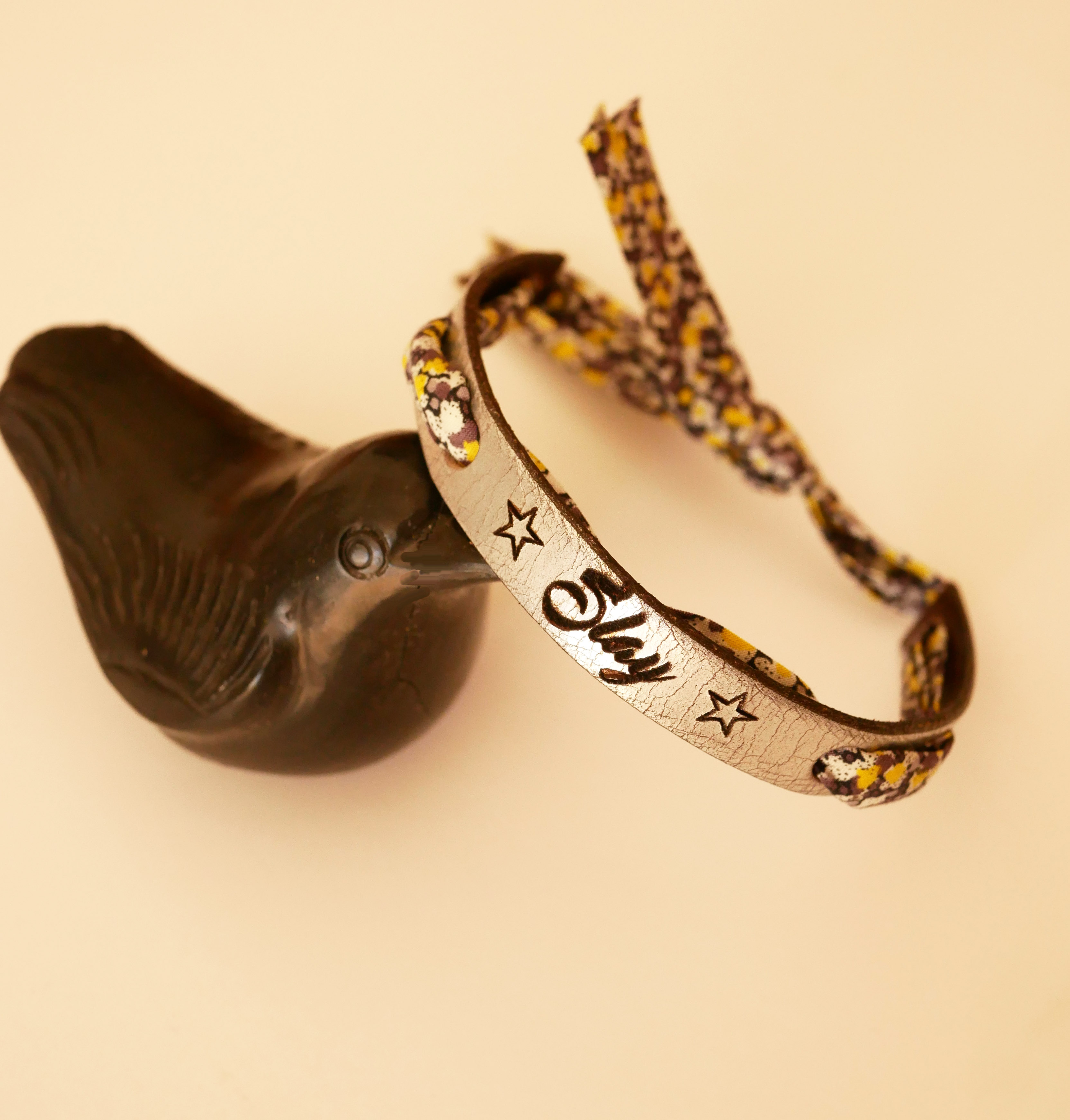 Florâme bracelet engraved with liberty ribbon yellow flowers on silver leather