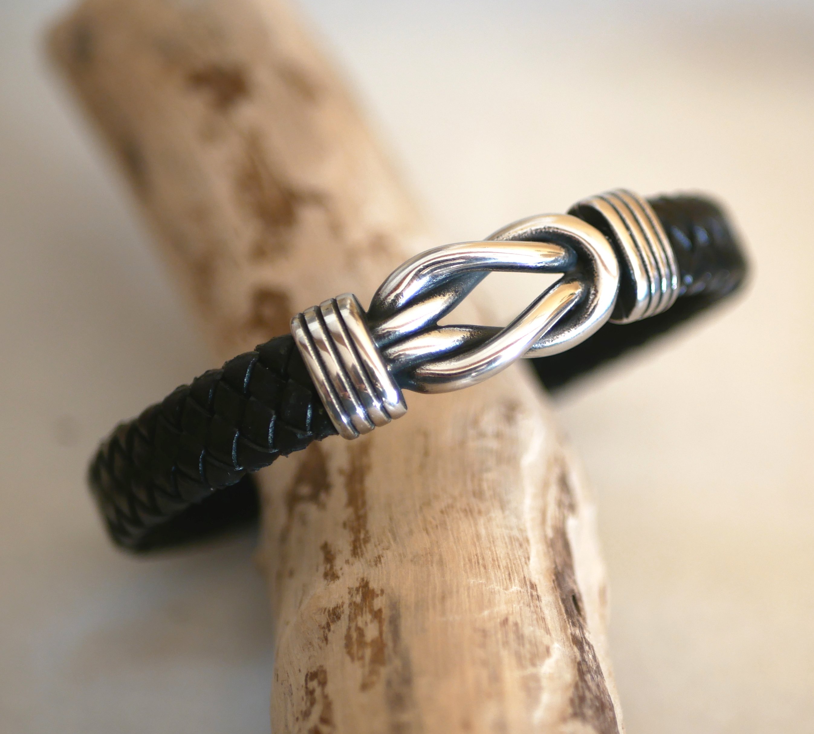 Black leather bracelet with Celtic knot and magnetic steel clasp