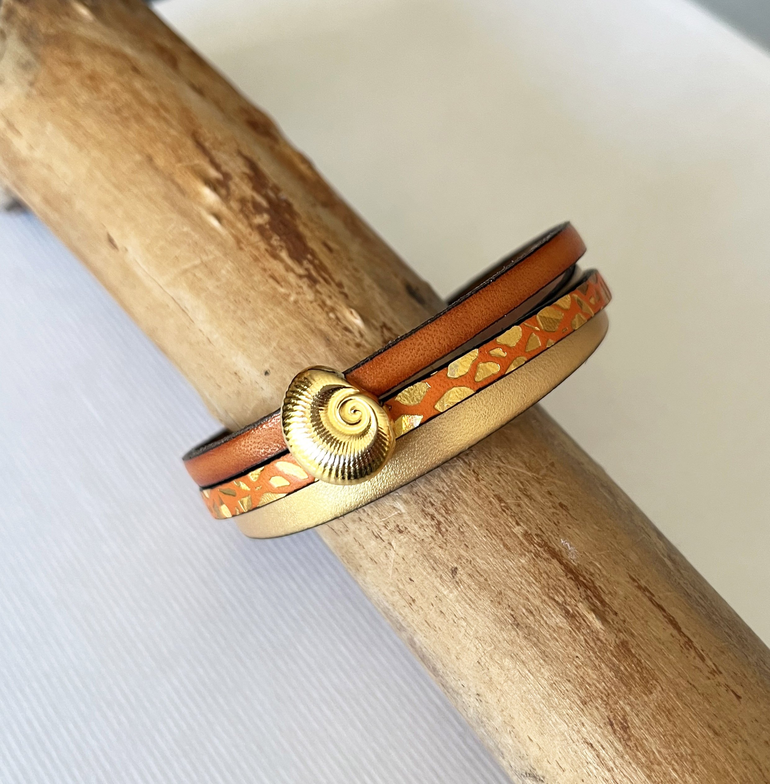 Women's gold cuff bracelet Gold and orange shell