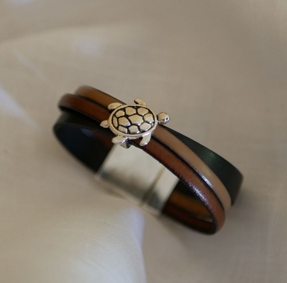 Multi-leather cuff bracelet with turtle design and large magnetic clasp