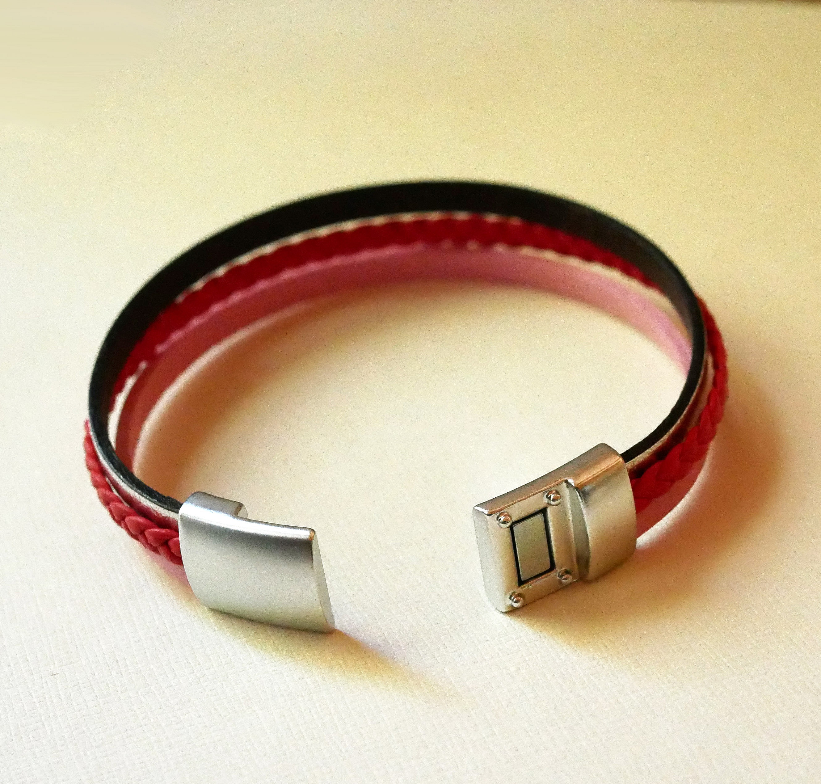 Coral red braided multi-leather cuff bracelet with silver and pink leather