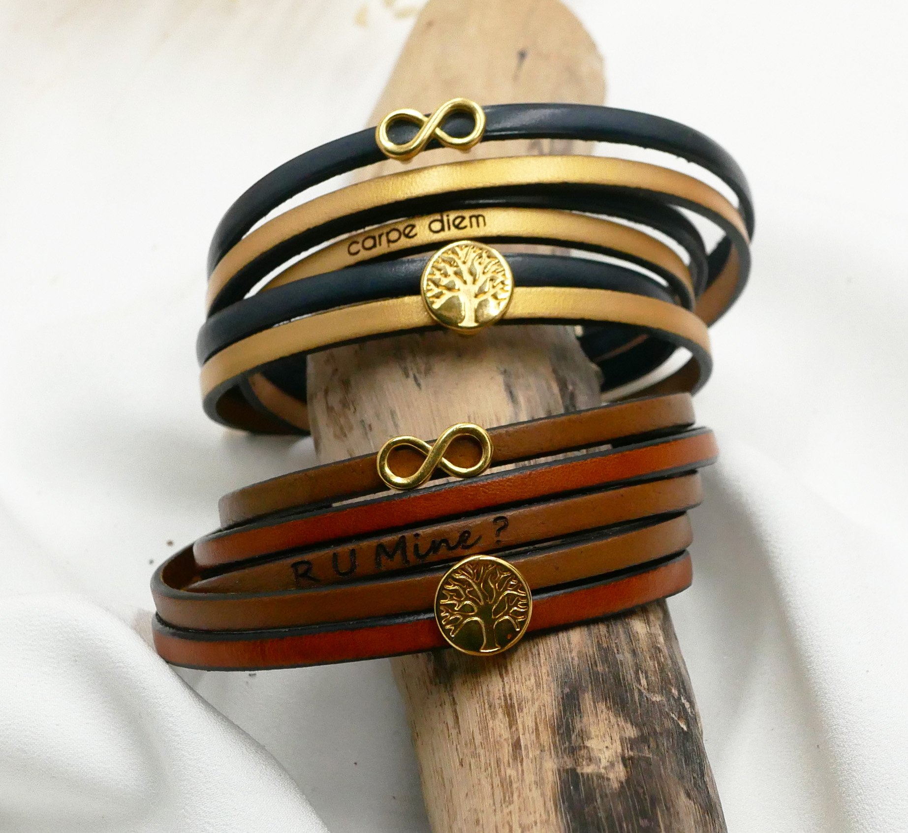 Multi-turn infinity symbol leather bracelet with gold tree of life cabochon to personalize  