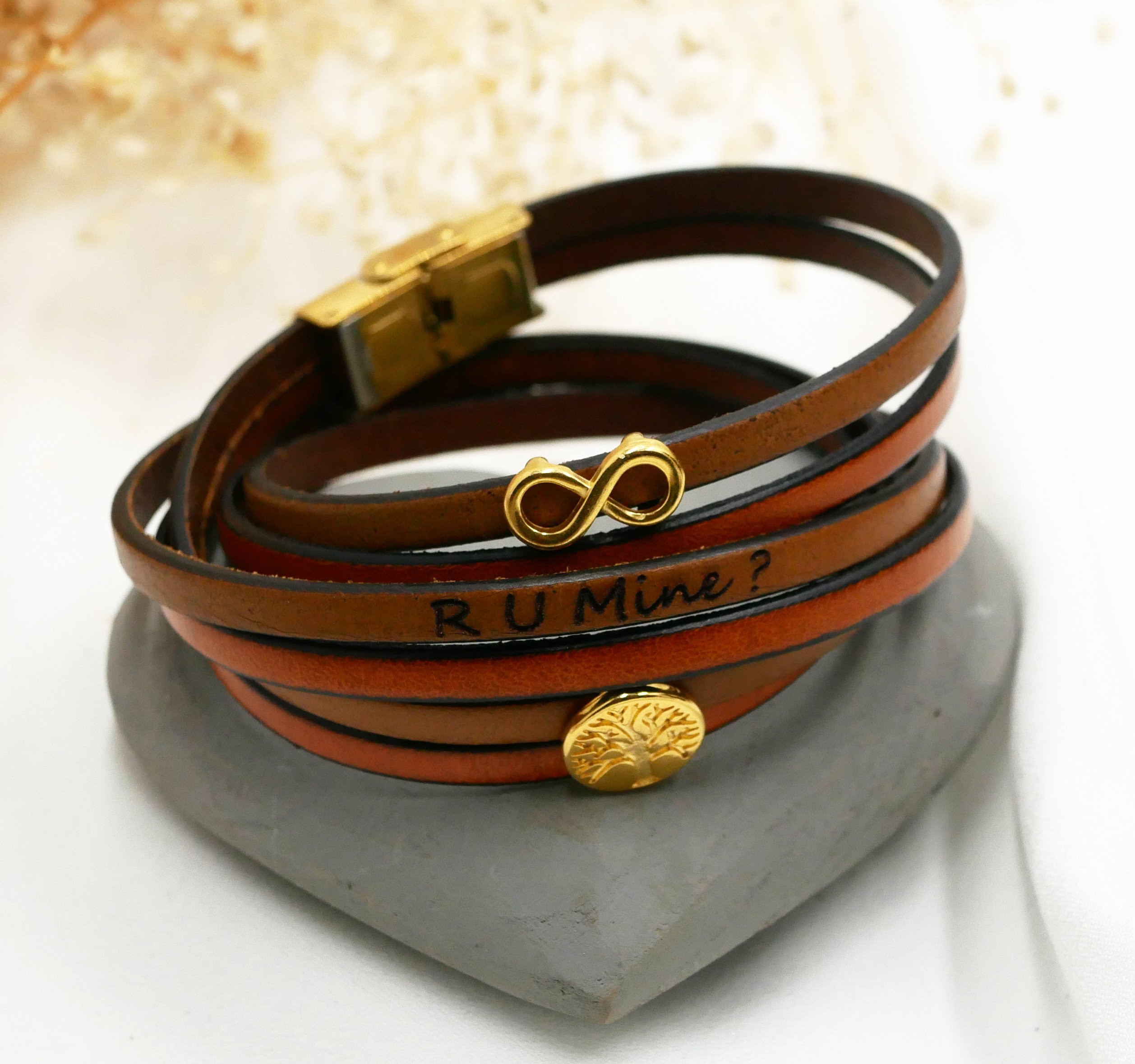 Multi-turn infinity symbol leather bracelet with gold tree of life cabochon to personalize  