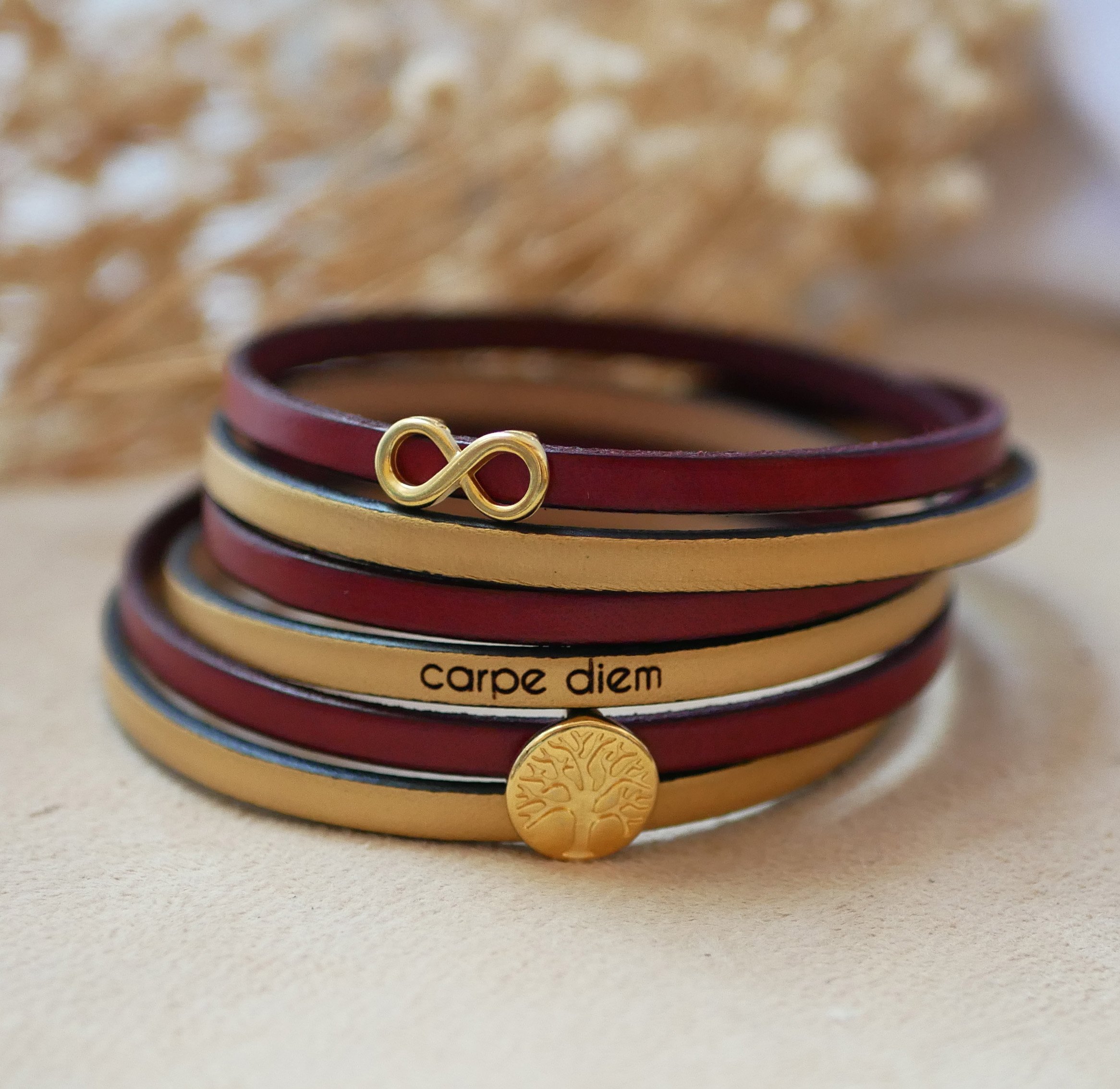 Multi-turn infinity symbol leather bracelet with gold tree of life cabochon to personalize  