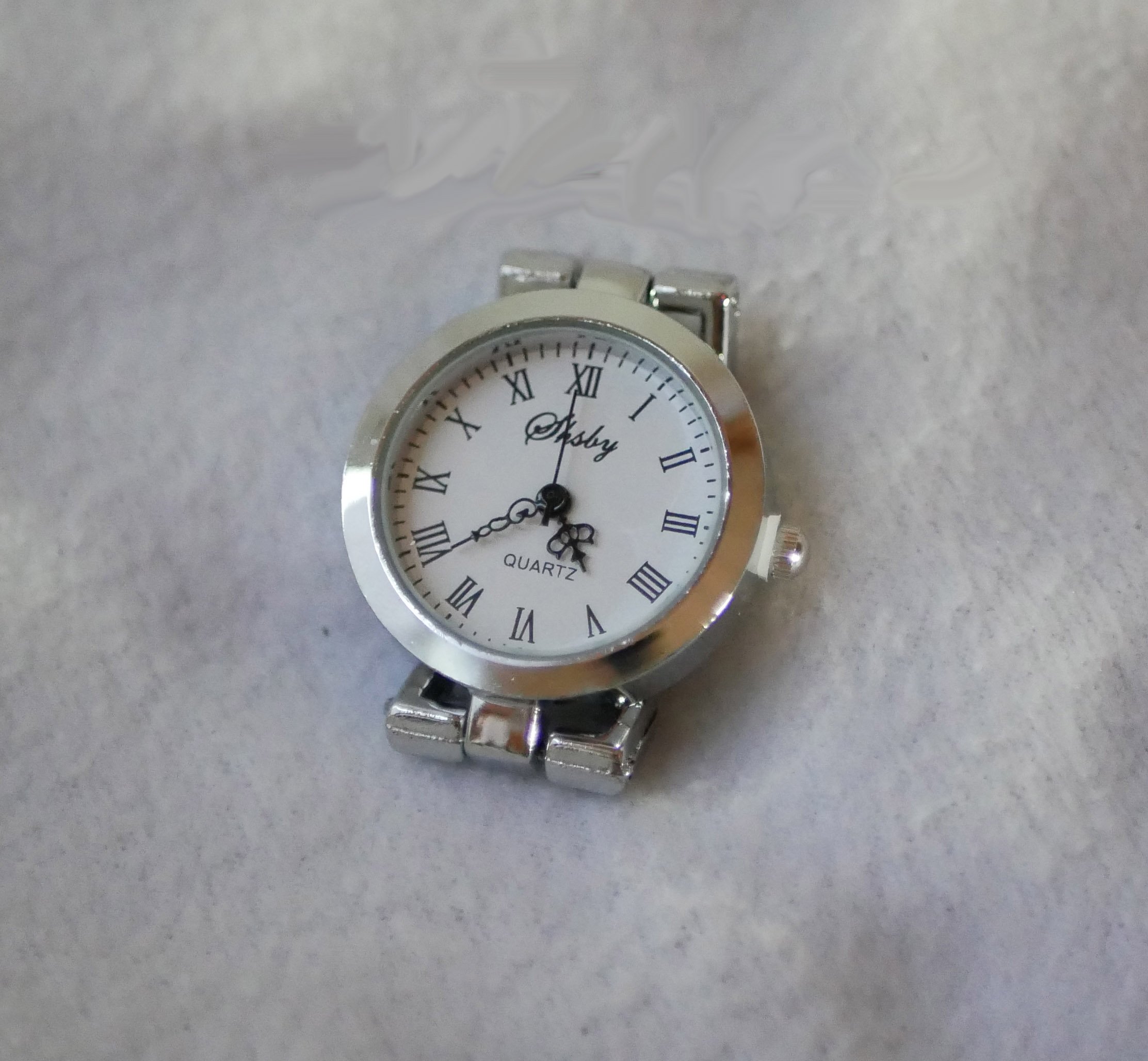 Watch dial silvered white background Roman numerals