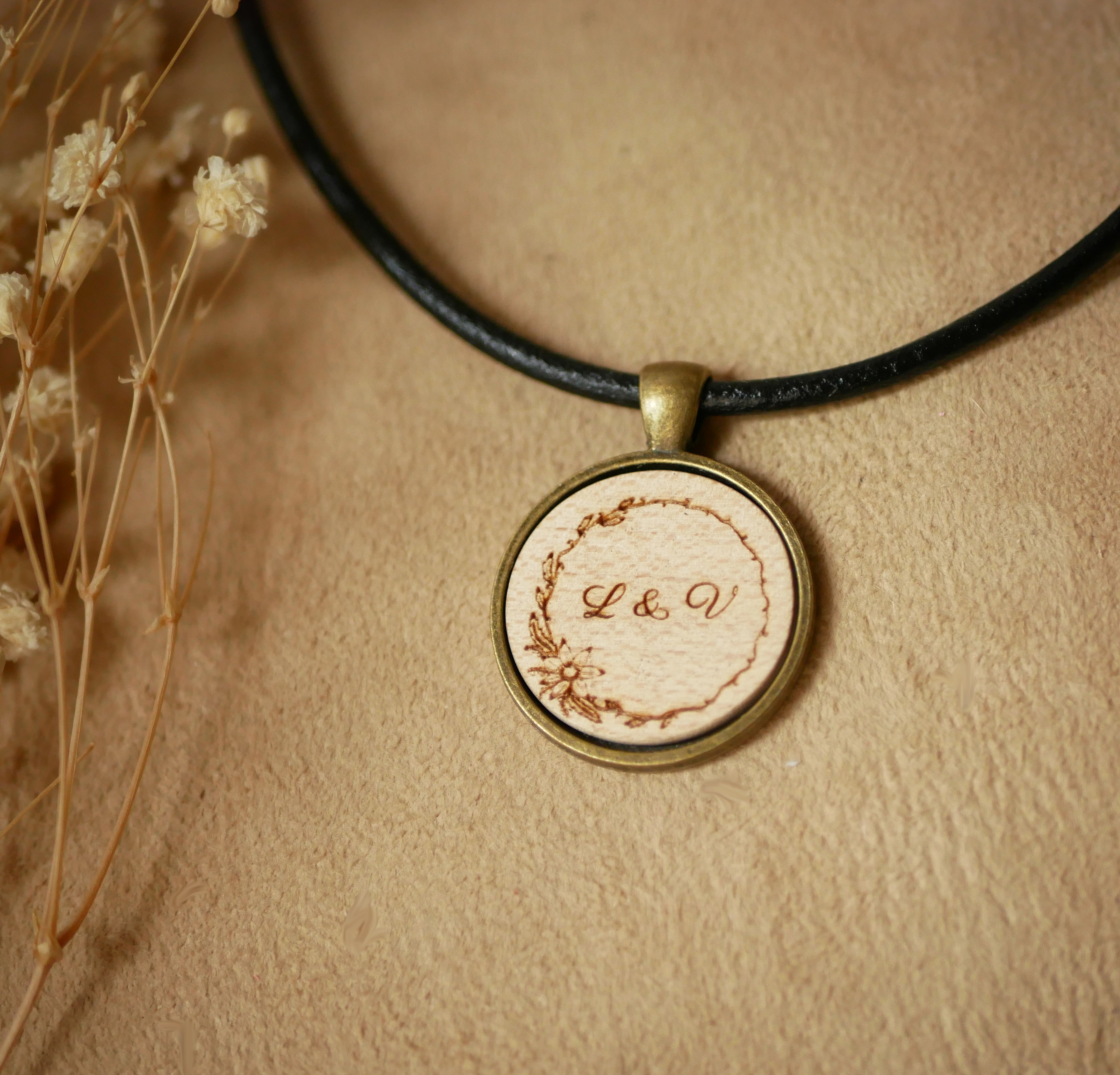 Leather necklace with engraved wood cabochon pendant set in antique brass to personalize