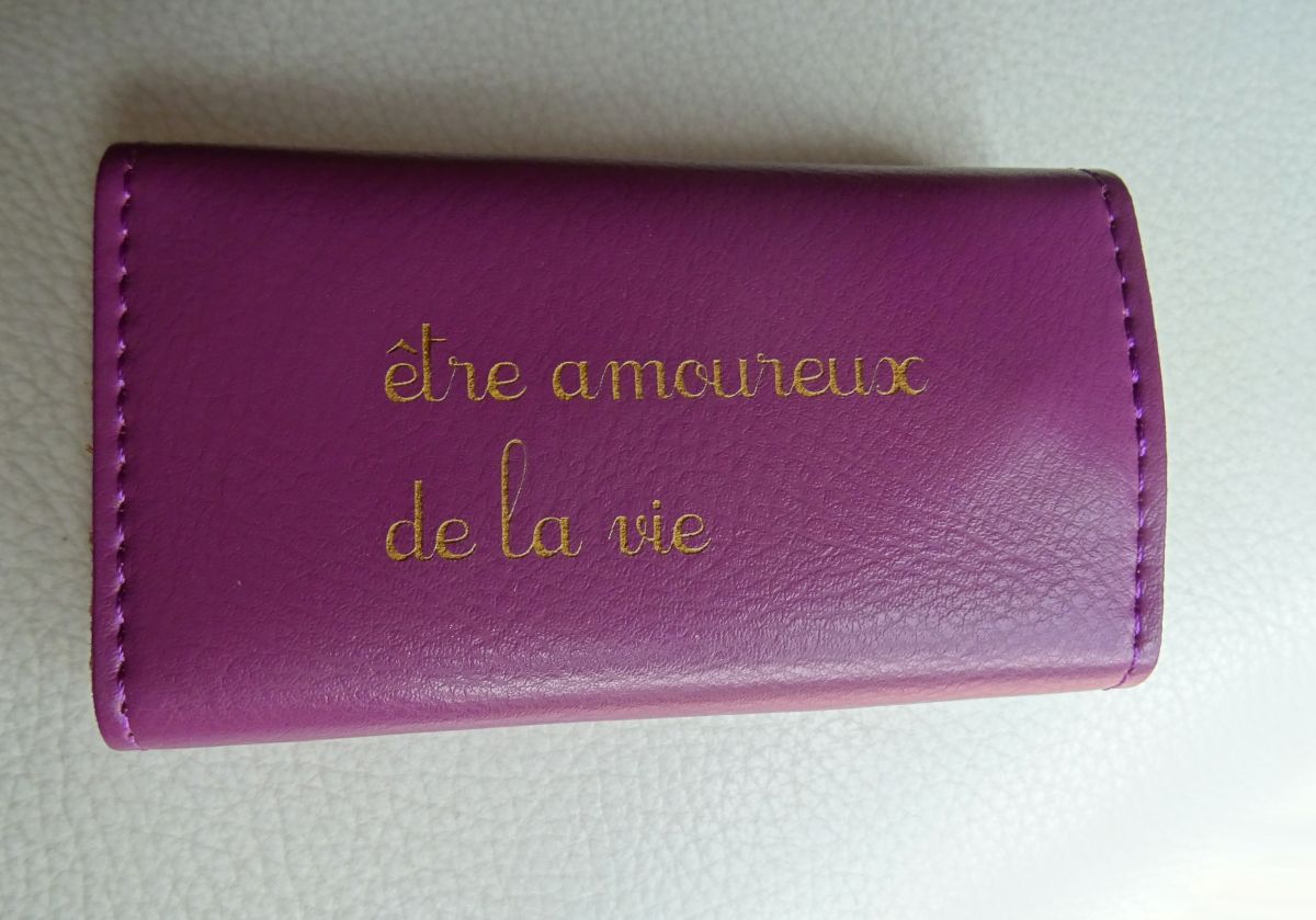 Engraved purple leather key case