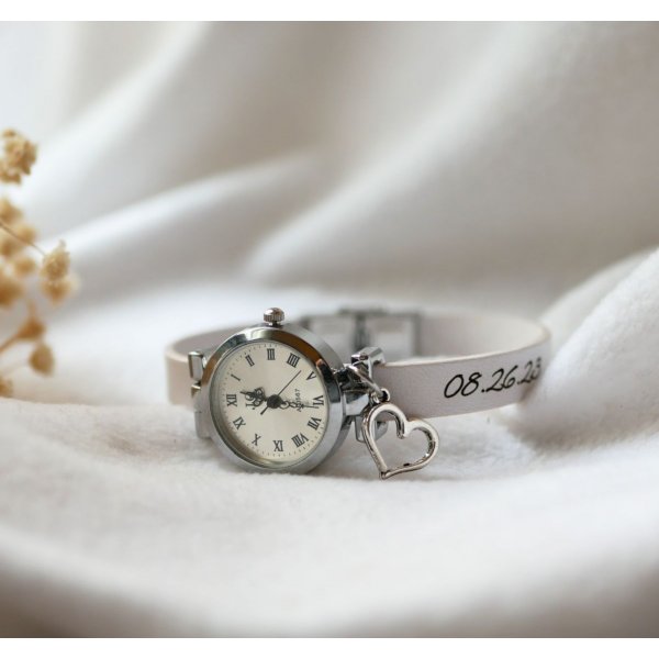 Silver watch with charm and leather strap with adjustable clasp