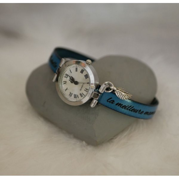 Silver watch with charm and leather strap with adjustable clasp