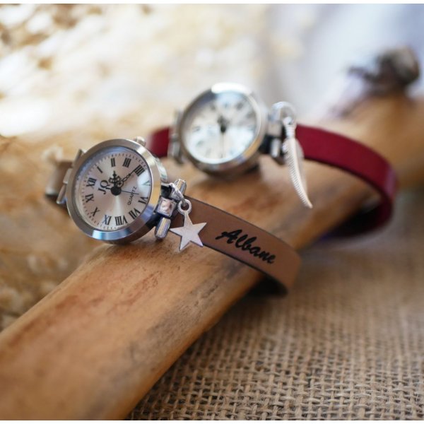 Silver watch with charm and leather strap with adjustable clasp