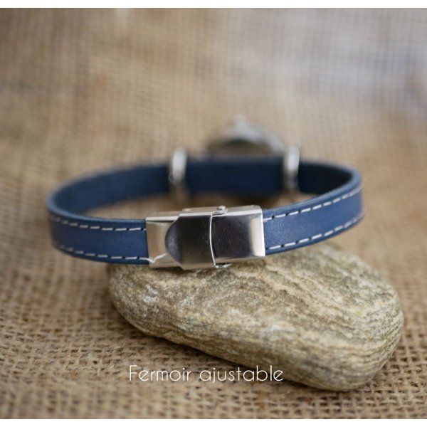 Watch with blue leather strap and white stitching