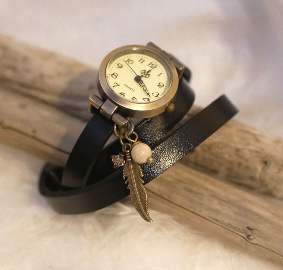 Leather bracelet watch with feather and pearl charms