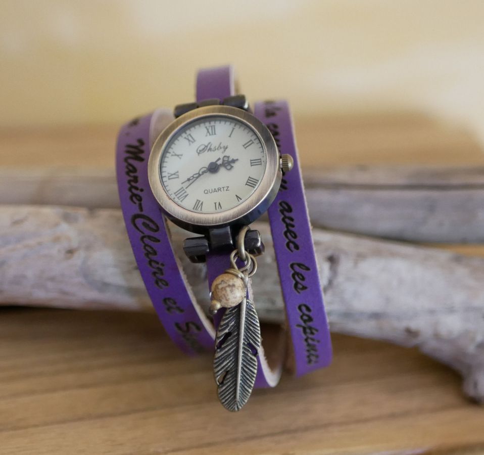 Leather bracelet watch with feather and pearl charms