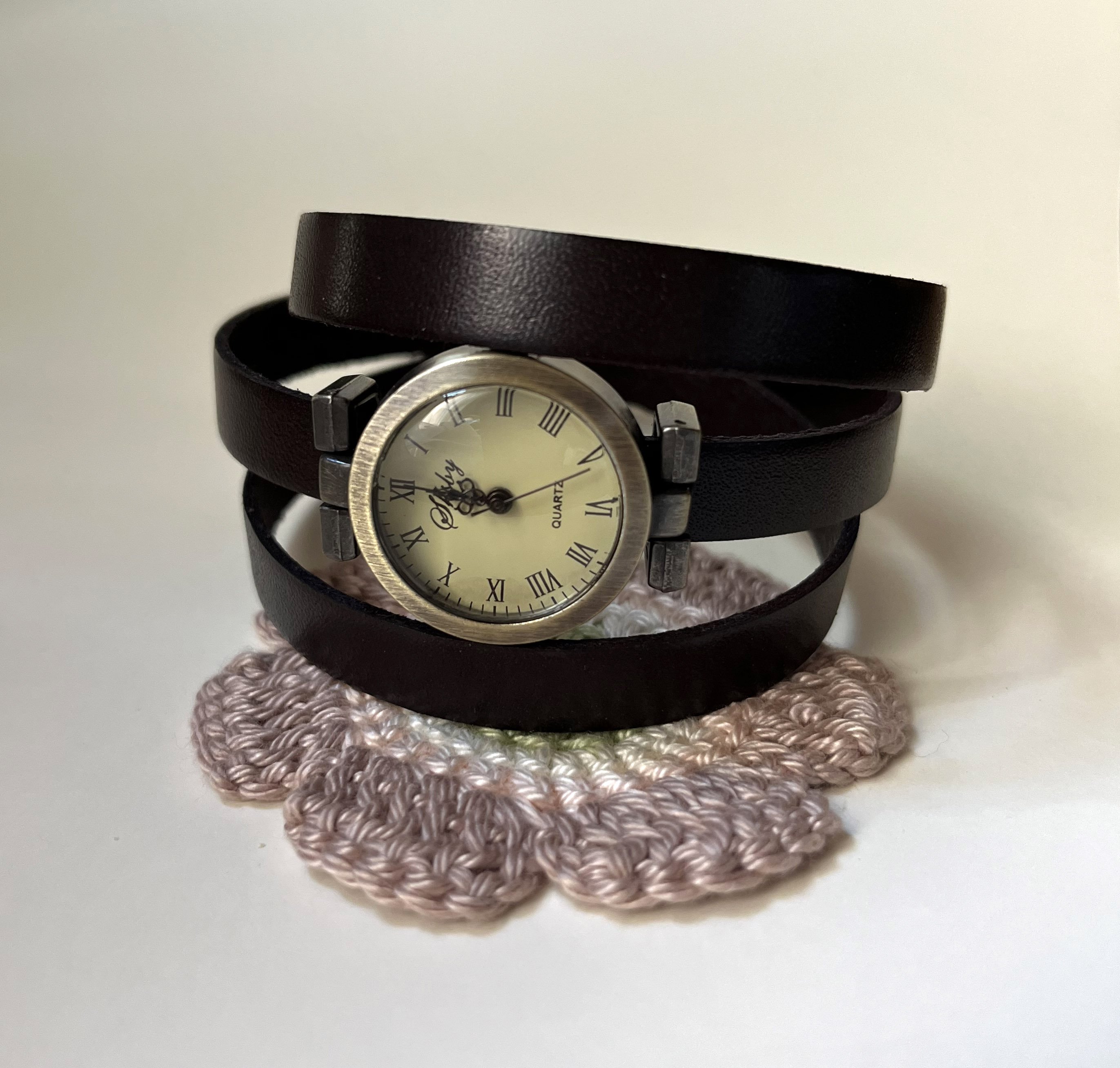 Customizable triple tour bracelet watch with bronze dial 