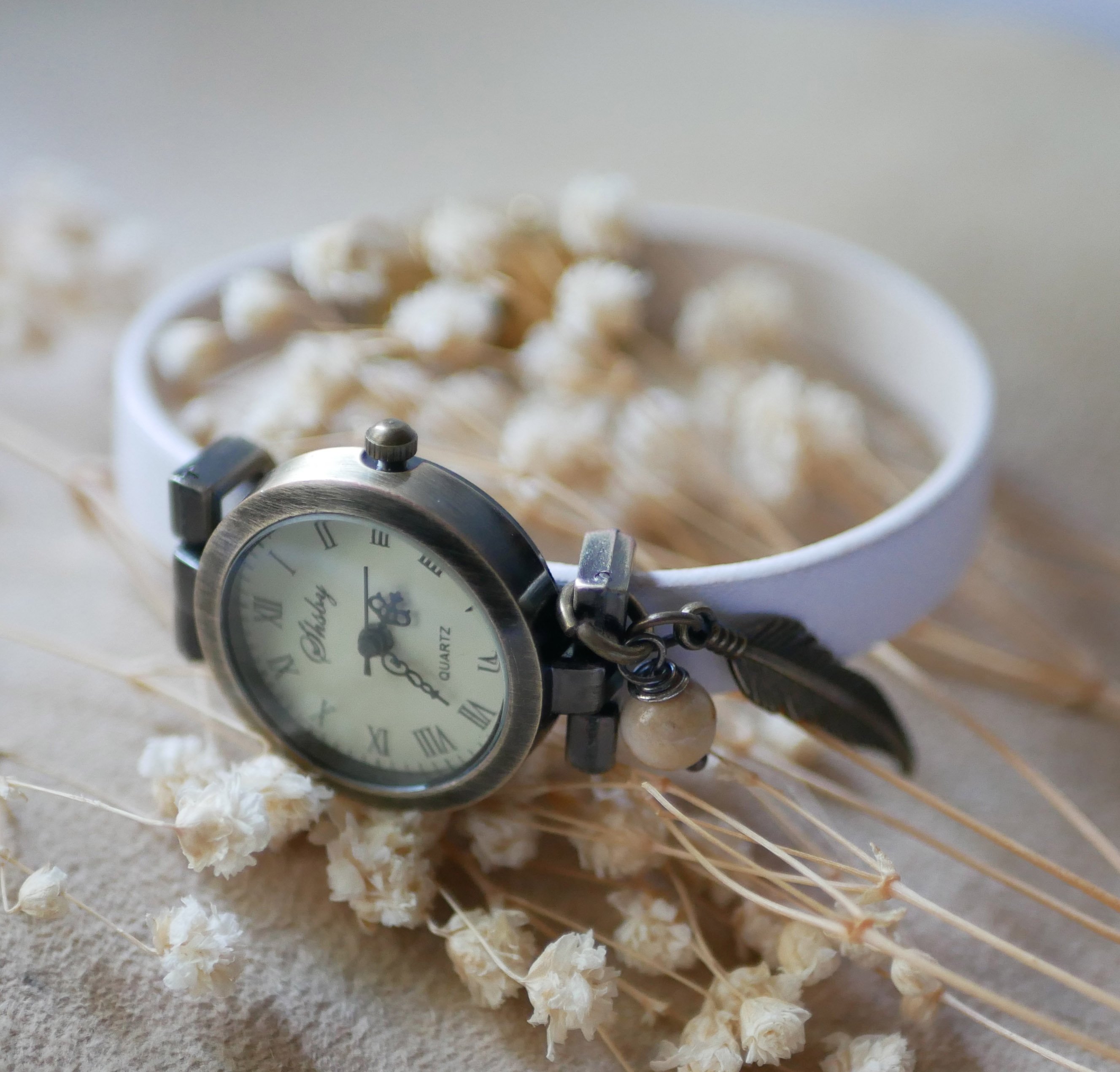 Watch with bronze dial and customizable leather strap