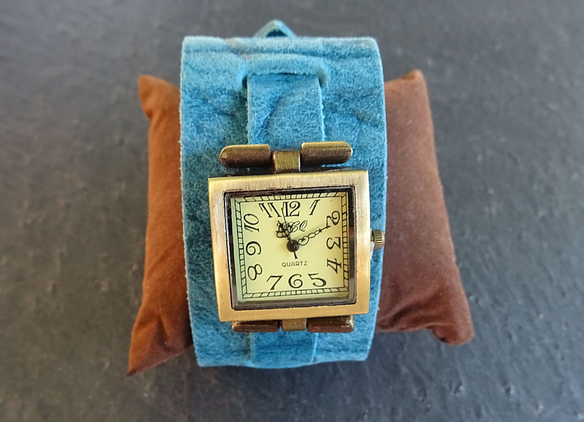 Square watch with blue leather cuff