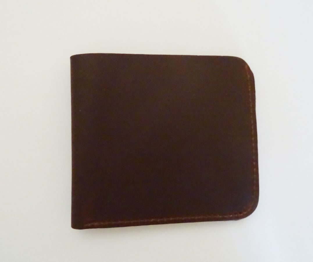 Thick brown leather card holder engraved