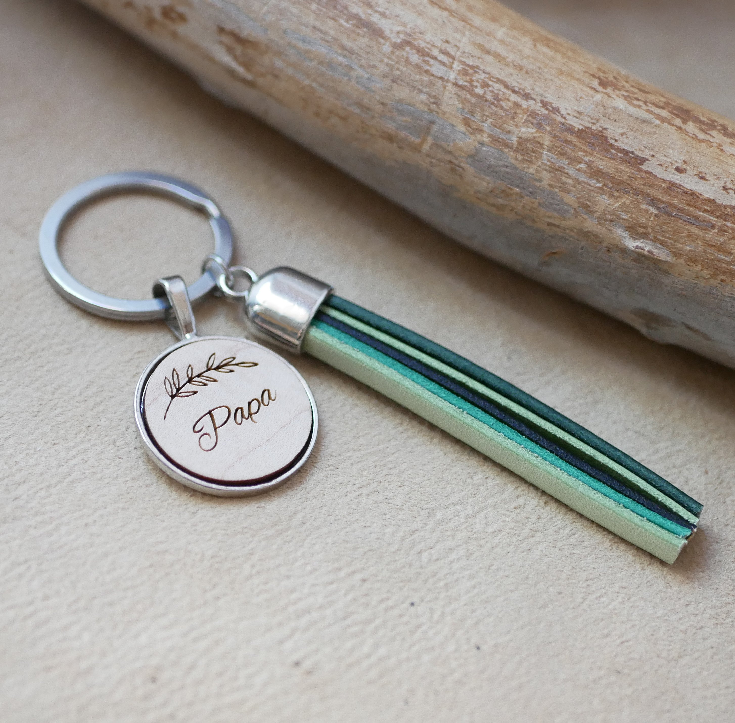 Personalized leather and wood key ring with leather pompom and engraved cabochon