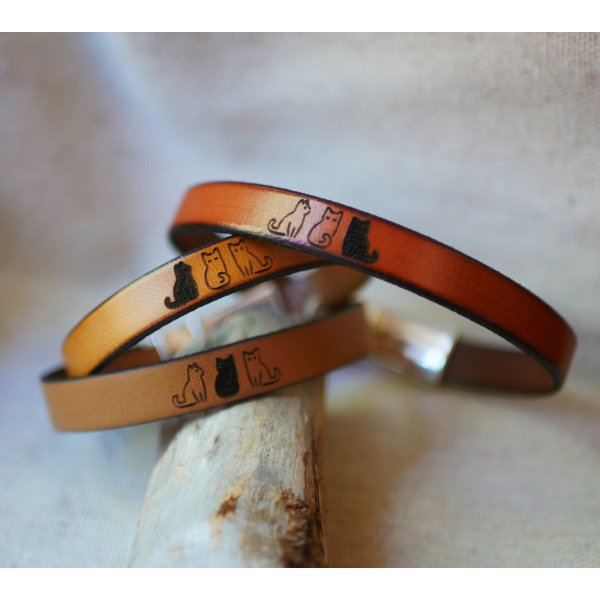 Trio of leather bracelets personalized by engraving with designs of your choice