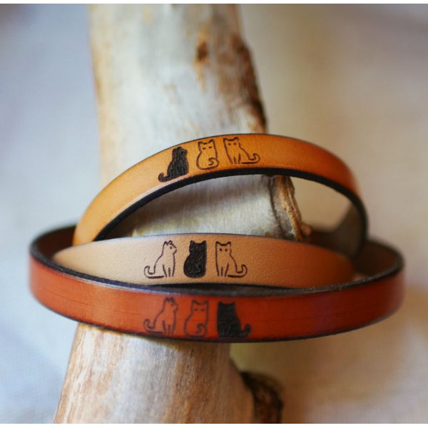 Trio of leather bracelets personalized by engraving with designs of your choice