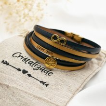 Multi-turn infinity symbol leather bracelet with gold tree of life cabochon to personalize  